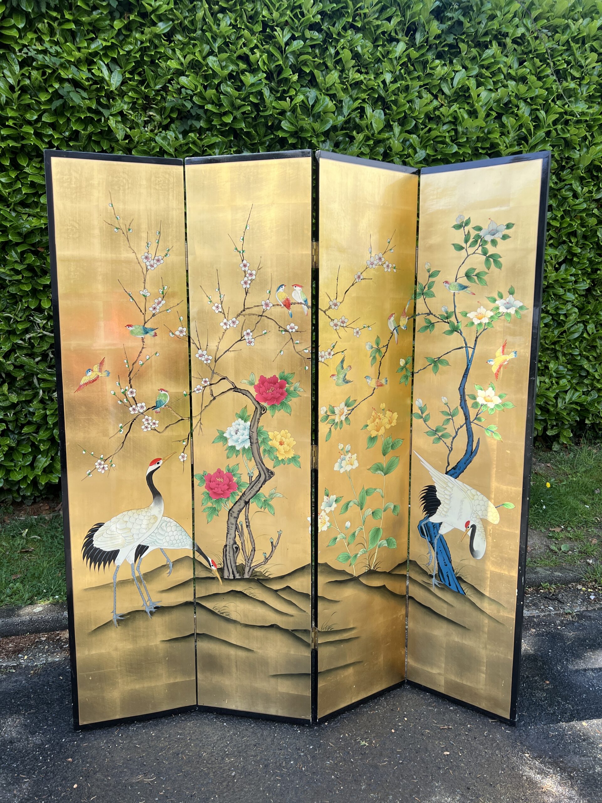 Paravent quatre feuilles en laque à décor polychrome