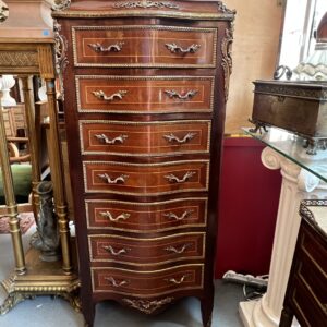 Semainier en bois de placage forme mouvementé et galbé