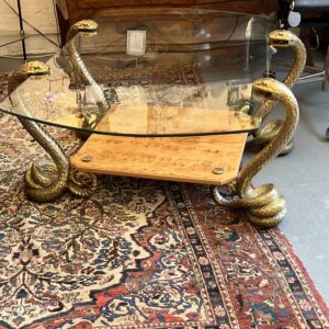 Table basse 70's, design, 4 pieds cobra en bronze massif, plateau verre