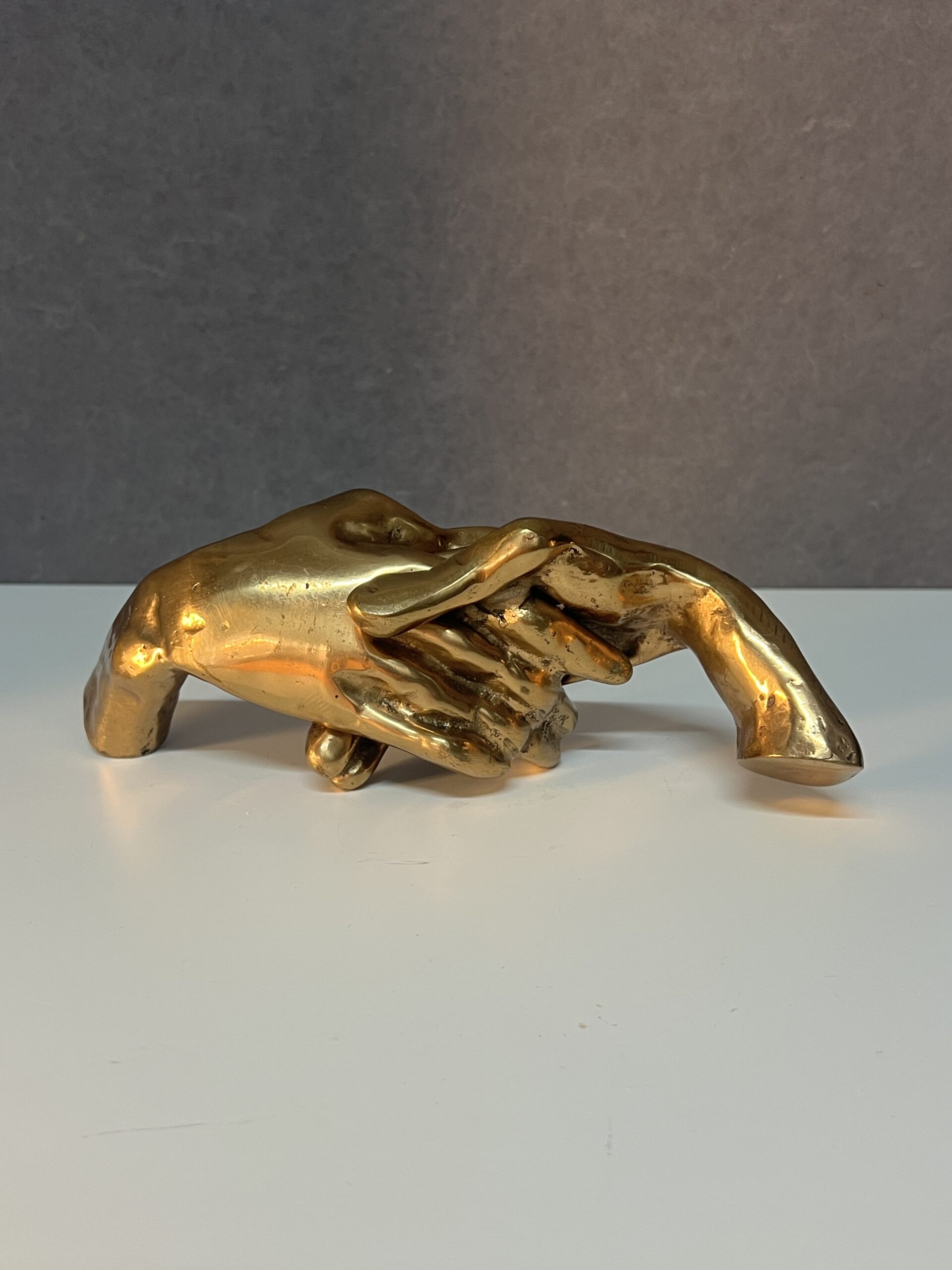 Poignée de main en bronze doré