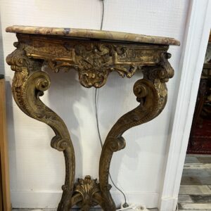 Exceptionnelle console d'entre-deux fenêtre d’époque Restauration, d’inspiration Louis XIV, vers 1830.